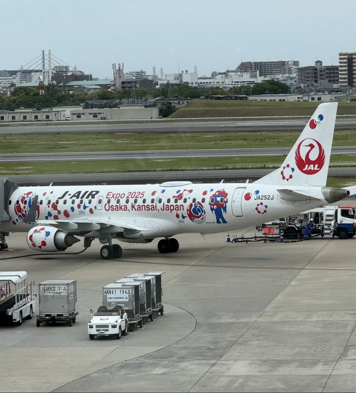 Japan Airlines aircraft in Expo 2025 Osaka livery on the airport apron